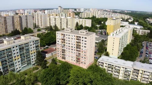Aerial View From a Drone a Colorful Cityscape with Apartment Buildings on a Sunny Day