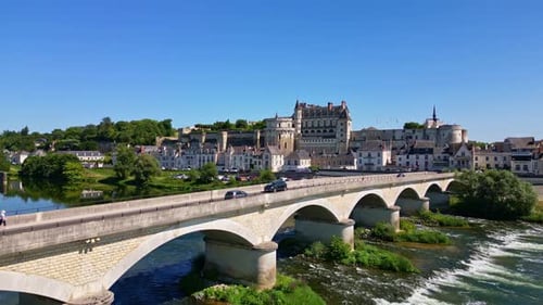 Aerial ascend over Amboise Chateau and bridge across Loire River