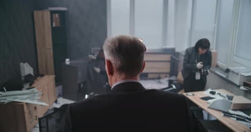 Office Robbery Case Crime Investigation Team Working at Crime Scene