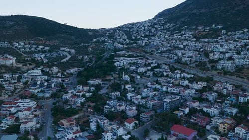 Aerial Video of Seaside Town at Sunrise with Coastal Villas and Calm Sea