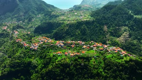 Small Town High in the Mountains Village In Green Forest At Summer Season Beautiful Landscape From