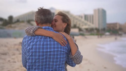Romantic Middleaged Couple Enjoying a Peaceful Evening Together on the Beach Love Connection and