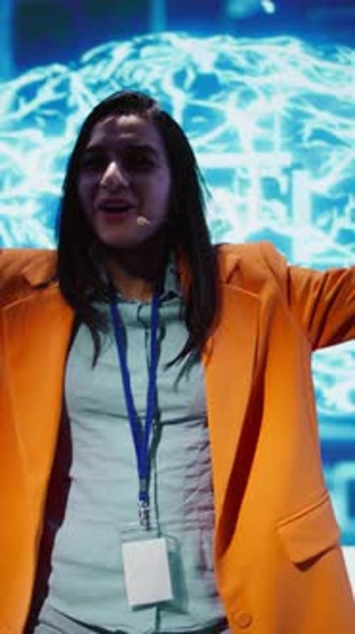 Young Woman Presenting at Tech Conference