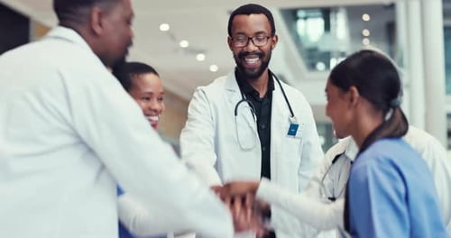 Applause, achievement and huddle with a team of doctors in the hospital for success