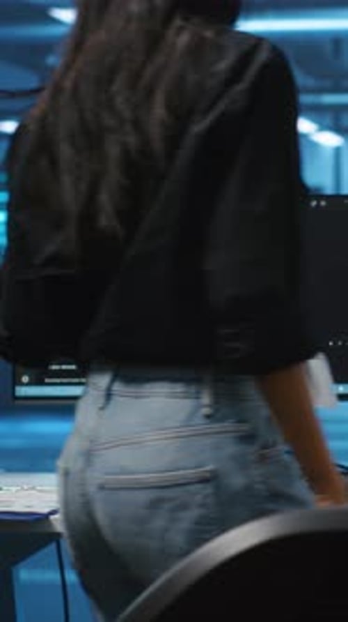 Vertical Video Data Center Employee in Remote Call Meeting with Colleagues Using Headset Mic