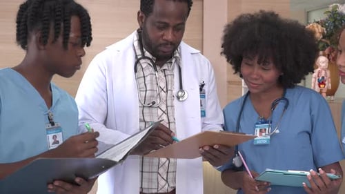 Group of doctor write on clipboard in the ward, Healthcare professionals during a meeting