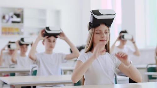 Children Using Virtual Reality Headsets in a Classroom