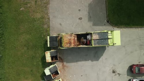 Aerial View Trash Truck Retrieving Waste From a Neighborhood