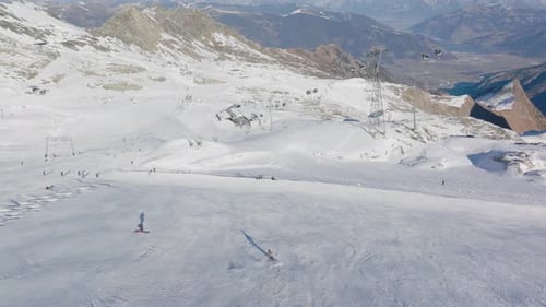 Drone Of Skier Skiing Downhill On Mountain