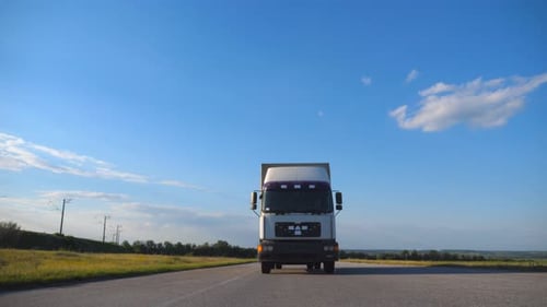Front View of Truck Driving on a Highway