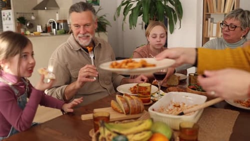 Family Meal Together Around a Dining Table