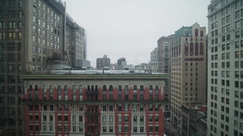 Raindrops Falling Across Manhattan Skyline Revealing Downtown Skyscrapers Under Gray Urban