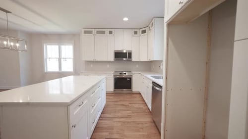 Modern Kitchen Interior with White Cabinets and Countertop