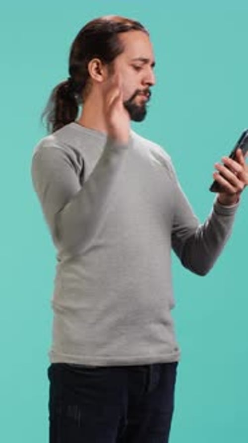 Vertical Video Jolly Person Feeling Positive After Receiving Good News During Telephone Call