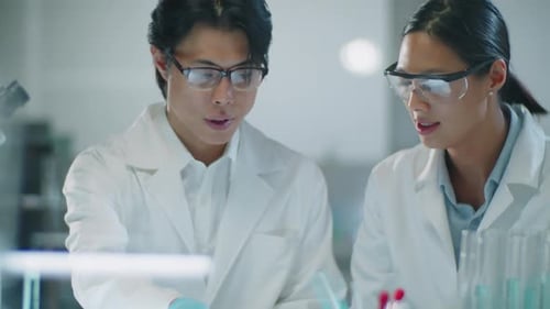 Scientists Collaborate on Research in Modern Laboratory