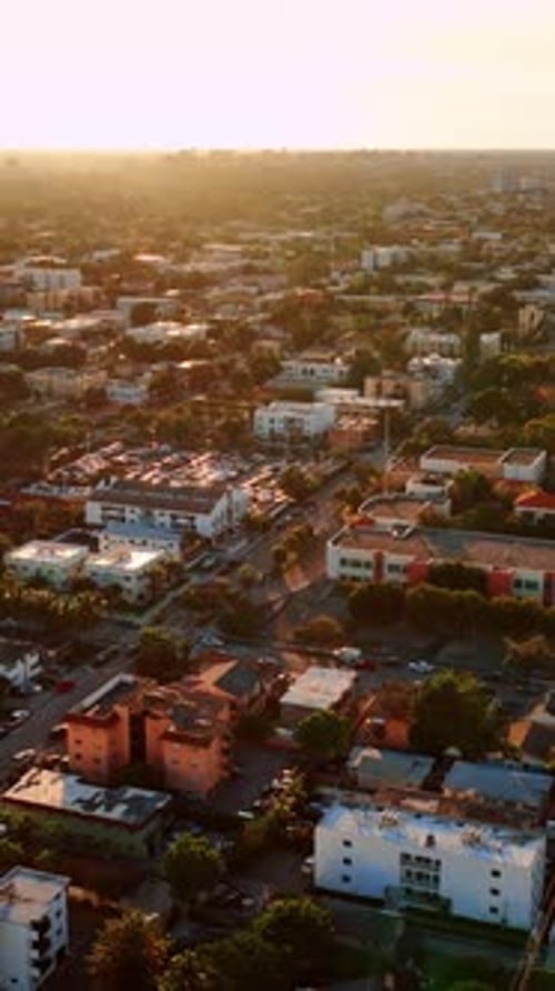 Sunset time above the vast cityscape of Miami, Florida, USA.