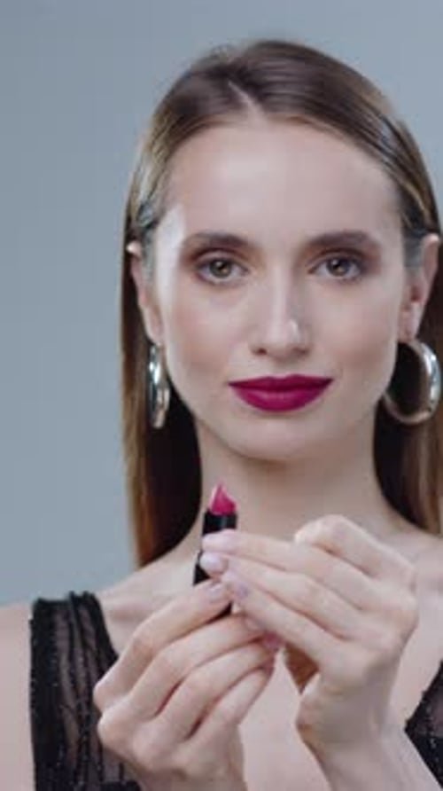 Smiling Woman Holds Lipstick, Fashion and Beauty
