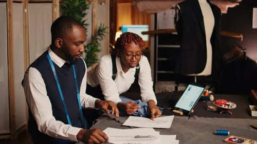 African American Tailors Picking Fabric