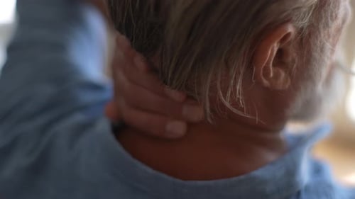 Closeup Back View of Unrecognizable Tired Senior Male Suffering From Neck Pain Exhausted Unhappy