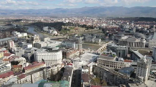 Drone shot of Alexander the Great statue in Square, historical buildings in Skopje