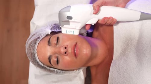 Woman Receiving Hifu Skin Tightening Facial Treatment