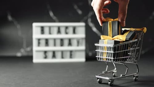 Gift Boxes Placed Into Shopping Cart With Sign