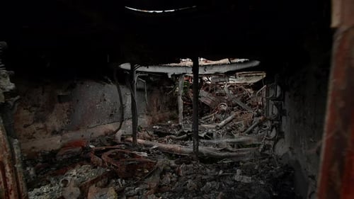 Burnt and Broken Tank Remains in Suburbs of Occupied Town