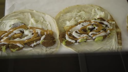 making falafel in pita bread in a restaurant in Sweden