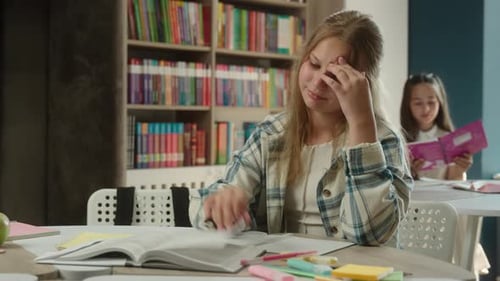 Bored Sad Girl Schoolgirl Teen Kid Caucasian Child Pupil Learner Upset Student at Desk Tired Lazy