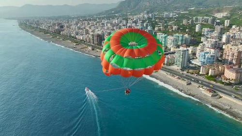 Aerial View Serene Sky Dance Parasailing Over Quiet Seas