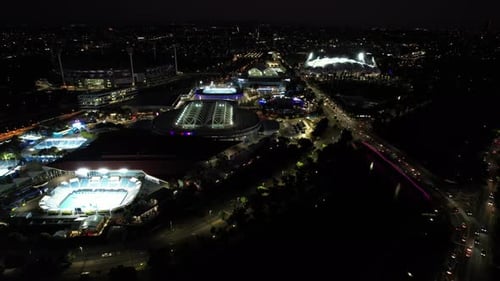 Melbourne sporting precinct aerial multiple sporting stadiums night
