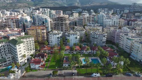 Aerial Video Aerial Perspective of a Vintage Villa Complex with Classic Architecture and Scenic