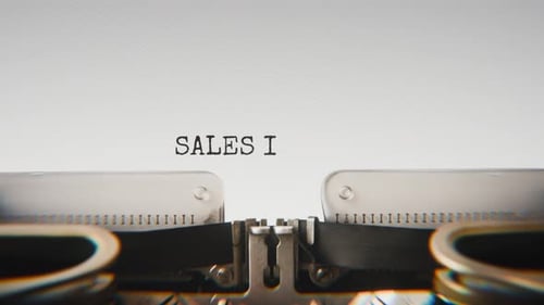 Old mechanical typewriter typing Sales Increased By 12% in a close-up view.