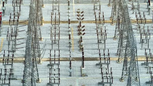 A high voltage power station from above by aerial view drone.