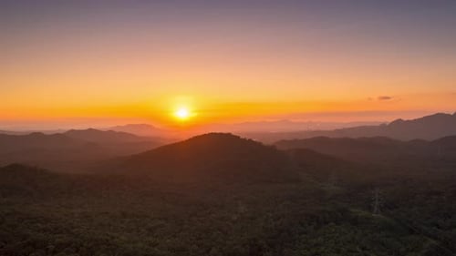 Aerial view Beautiful of morning scenery Golden light sunset on high mountains.