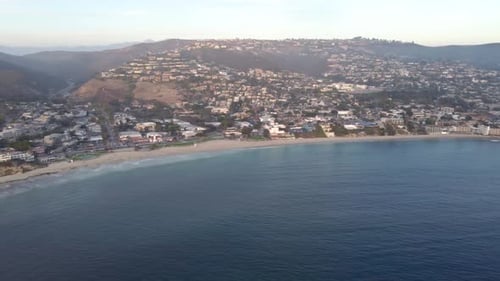 Downtown Laguna Beach, at Sunset. Orange County, Southern California Coast, USA. Drone View of Ocean