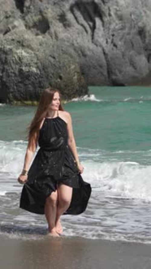 Woman Beach Walking Happy Carefree Female Enjoys Ocean Waves Summer Vacation Vertical Video