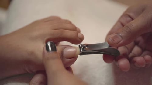 Toenail Clipping During a Pedicure Session