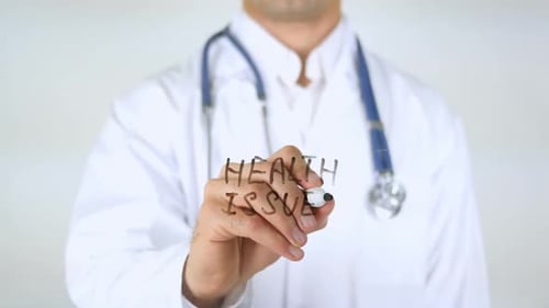 Health Issues Doctor Writing on Glass