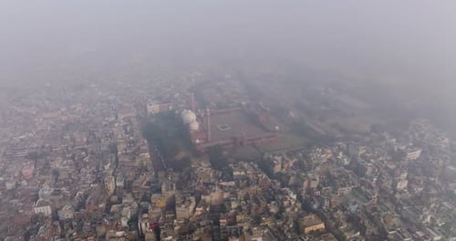 Aerial view of bustling Chandni Chowk with mosque, India.