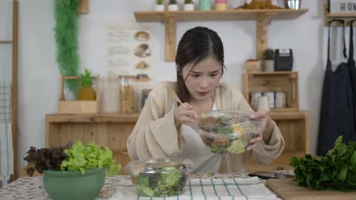 Woman Prepares Healthy Salad at Home