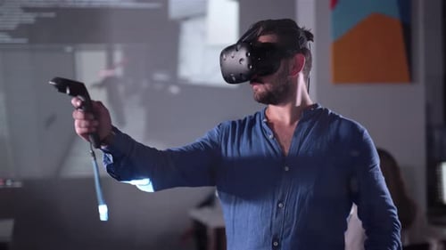 Concept Futuristic Design Yound Man Architect or Engineer Wearing VR Headset for Working Design 3D