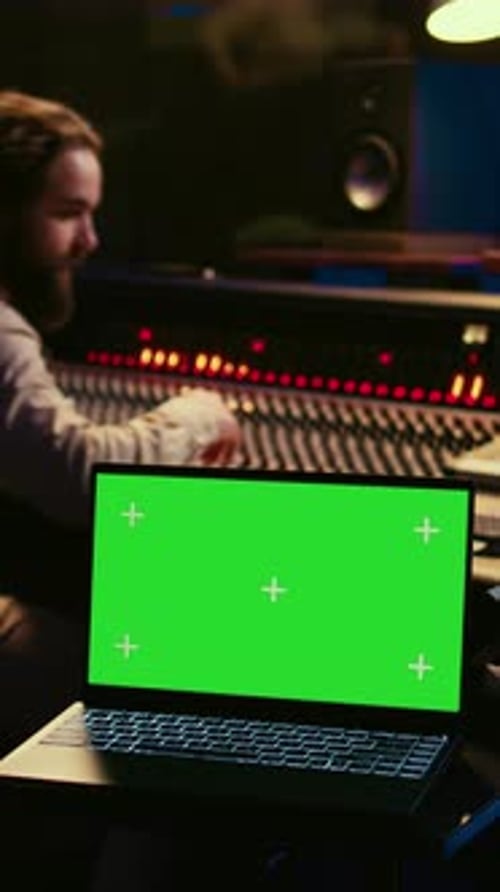 Vertical Video Music Production Engineer Mixing and Mastering Music in Control Room