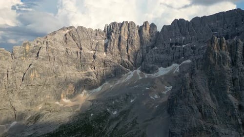 View of different mountain peaks during sunset in the Dolomites, Italy. Amazing scenic viewpoint.