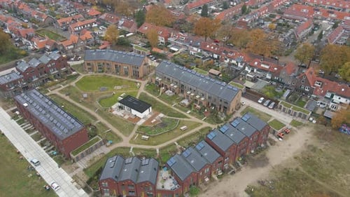 Aerial View of Eco-Friendly Solar Panel Community