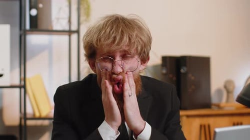 Tired Young Business Man Suffering From Headache Problem Tension Migraine Stress at Home Office