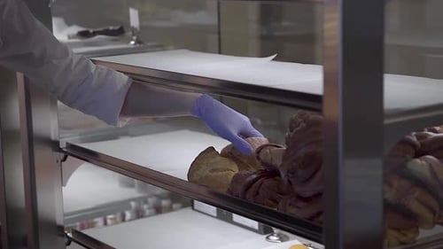 Variety Of Bread Inside A Bakery Shelf In A Coffee Shop. close up