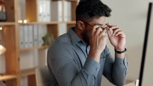 Headache, glasses and business man stress, anxiety or fatigue for night working on office computer