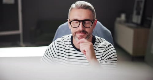 Business, thinking and man in office, computer and planning for project, internet and copywriting