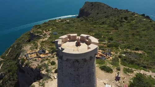 Renaissance Architecture Of Torre del Cap d'Or In Rocky Outcrop In Moraira, Costa Blanca, Alicante
